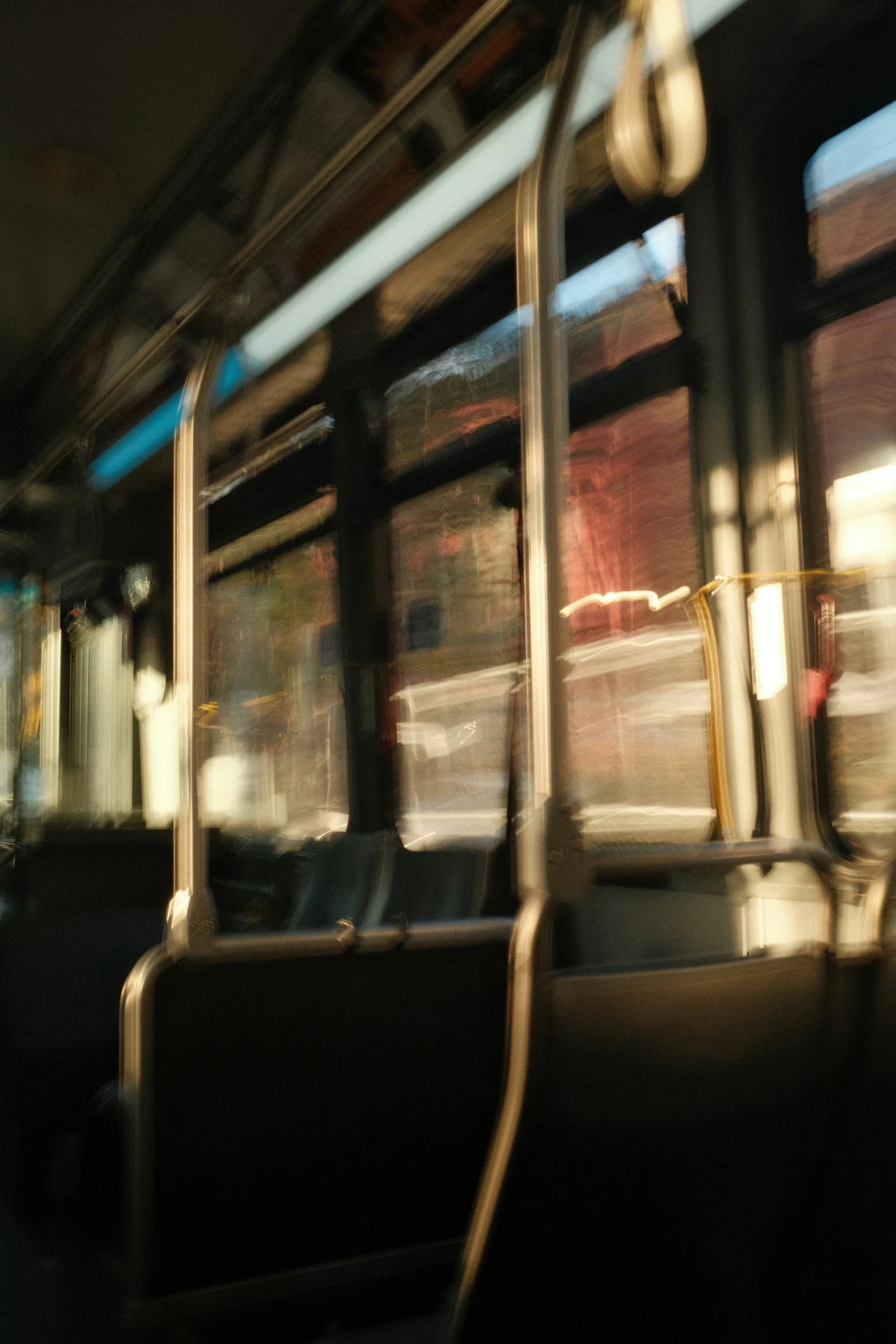 a blurry po of seats in a bus
