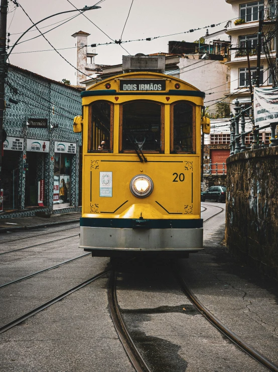 a very pretty old fashioned train on the tracks