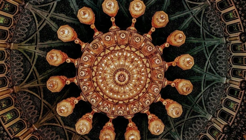 a view from the center of a decorative ceiling of an ornate building