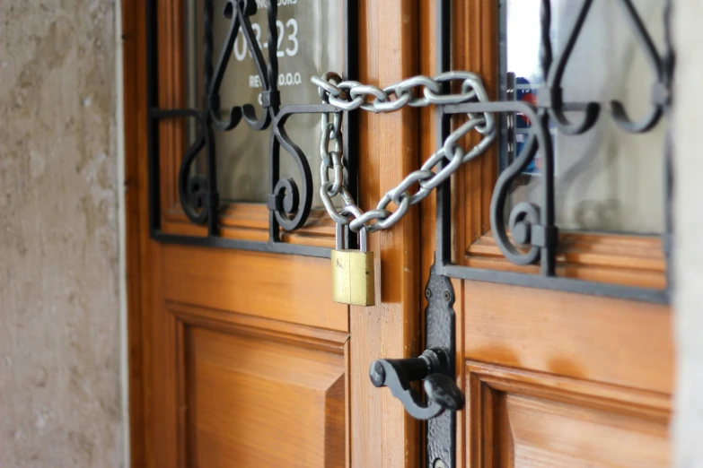 a metal lock that is attached to the front door