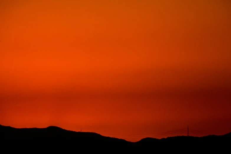 the red sky is not in cloud as seen at sunset