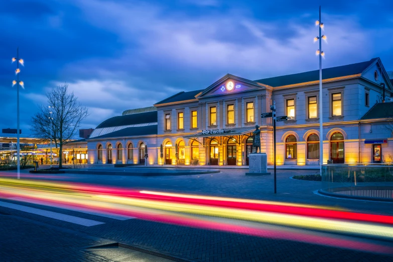 the beautiful building is lit up with lights