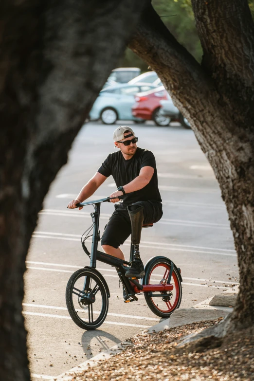 a man riding his bike through the woods