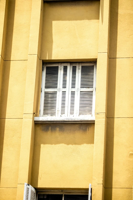 a building with windows in between the walls