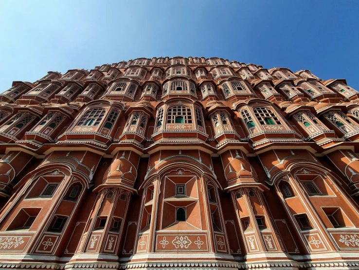 looking up at a building's intricate carved architecture