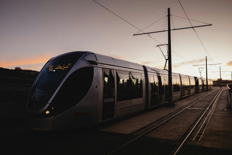 a very large long train on a steel track