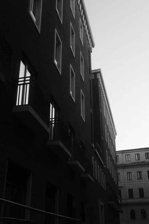 the top of some buildings with several windows