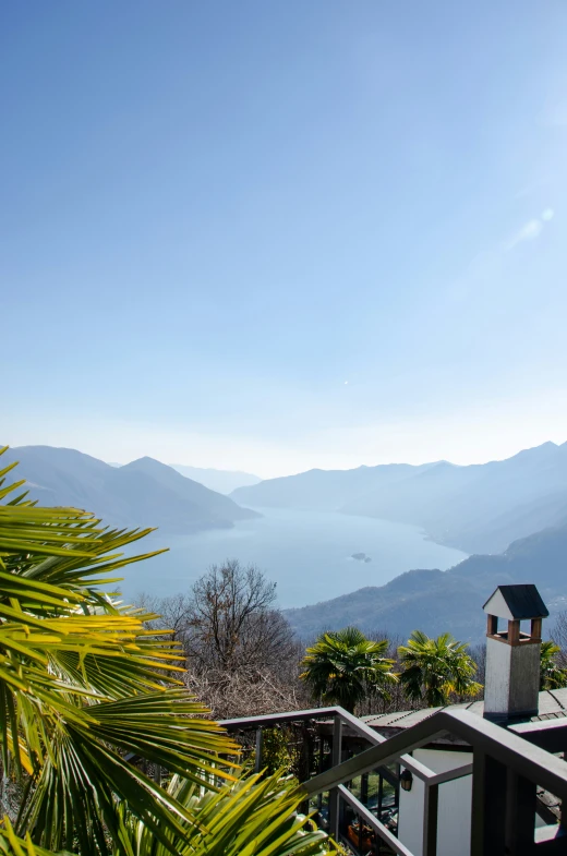 a view from a balcony overlooking some mountains