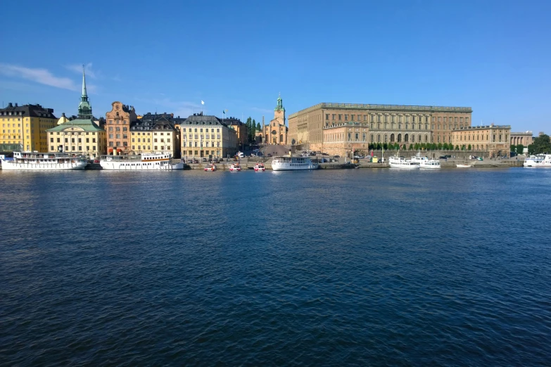 boats are floating on a body of water