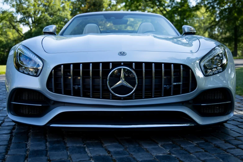 mercedes benz benz benz benz sports car parked on the street