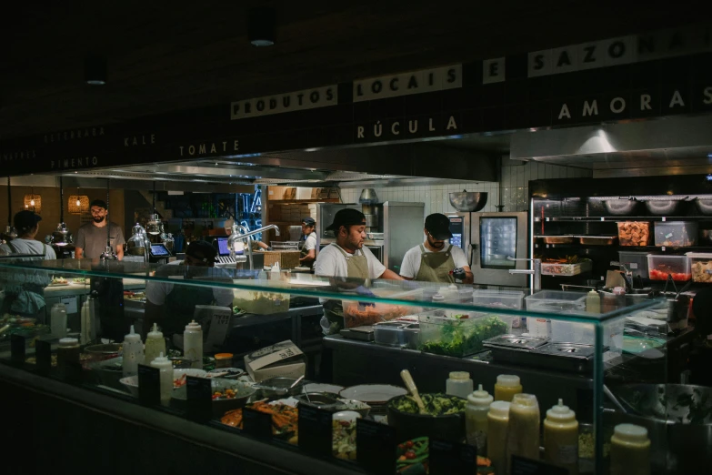 customers dine behind the counter of a restaurant