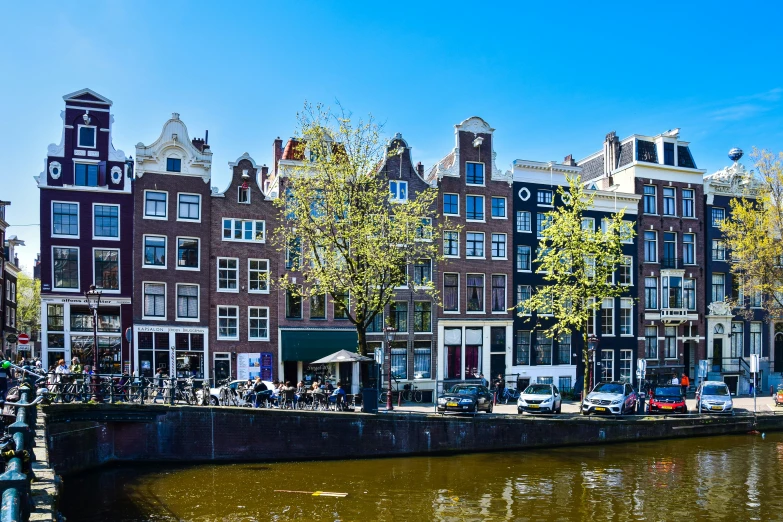 a group of buildings next to some water