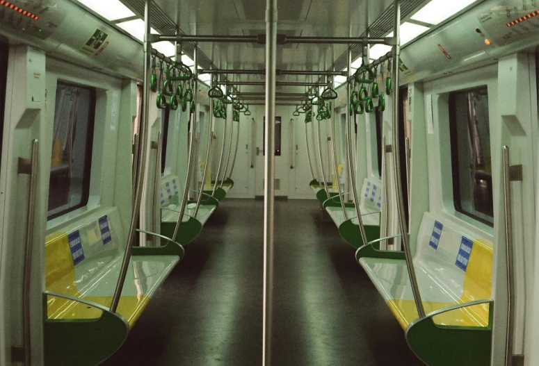 a train's empty seats and floor in a passenger compartment