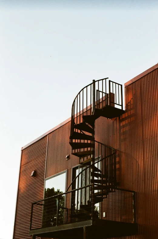 some brown brick with a fire escape in front