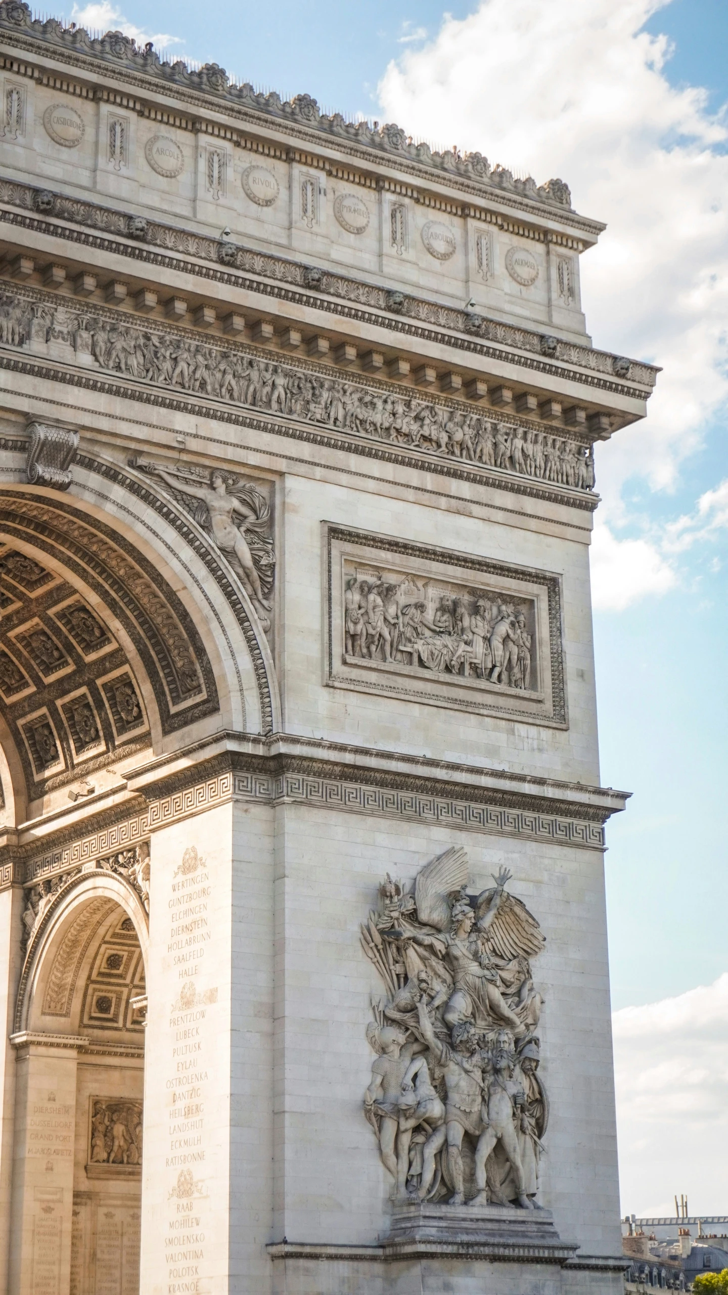 the building has a stone archway over it