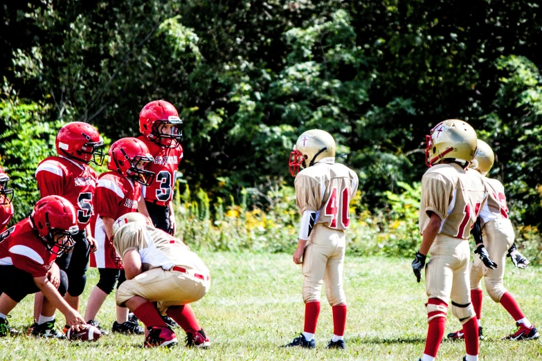 a little girl plays with her older team