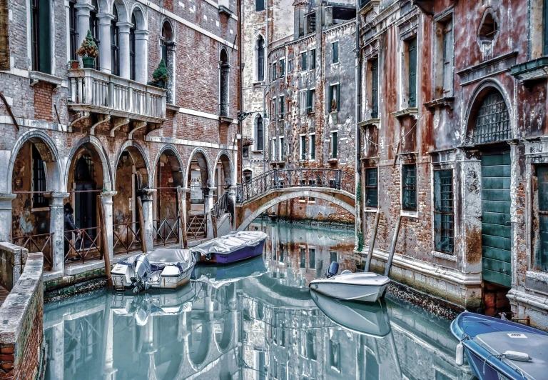 canal with boats in a quiet old city