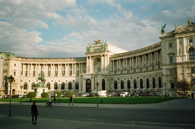 the building has many people outside in front