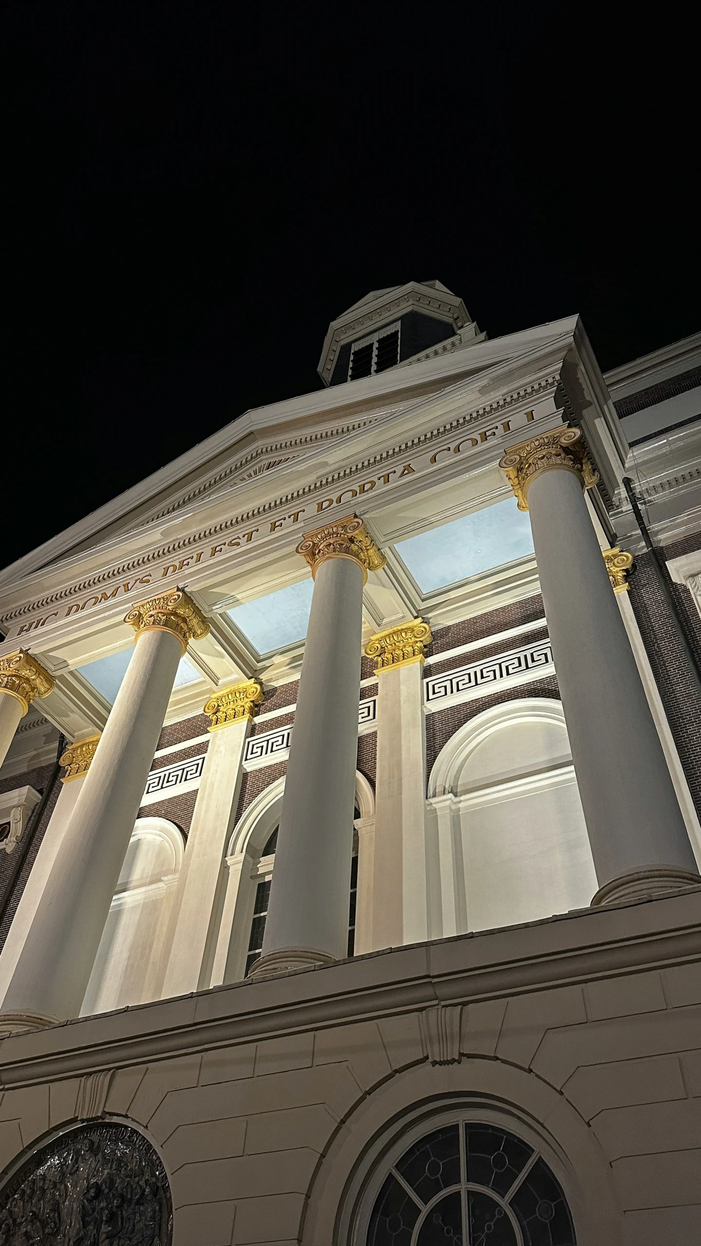 columns on the top of the building at night