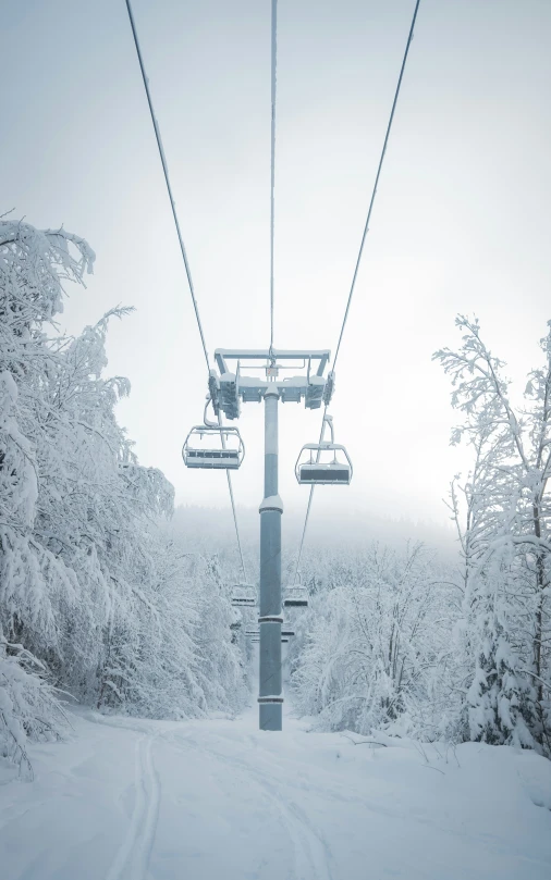 a ski lift with one chair on the top