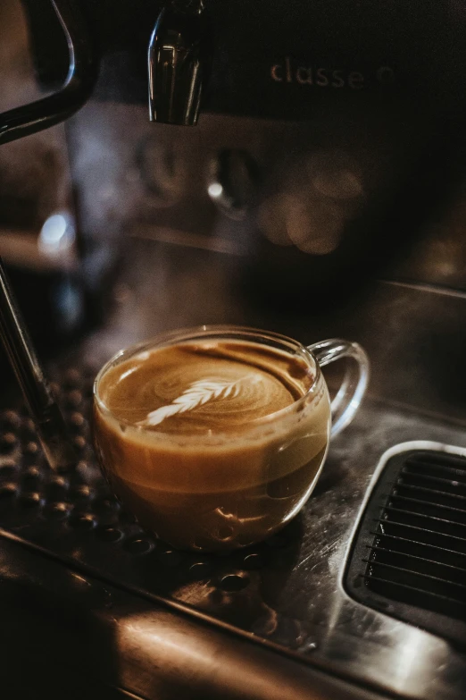 a cup sitting on top of a metal burner