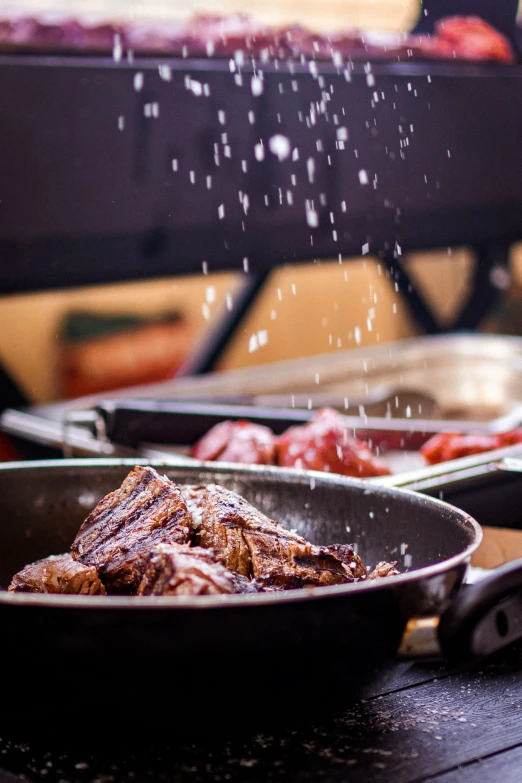 an iron pan and set filled with food