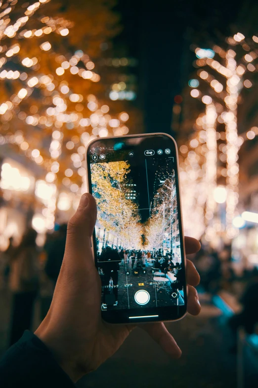 someone taking a picture of fireworks on the night