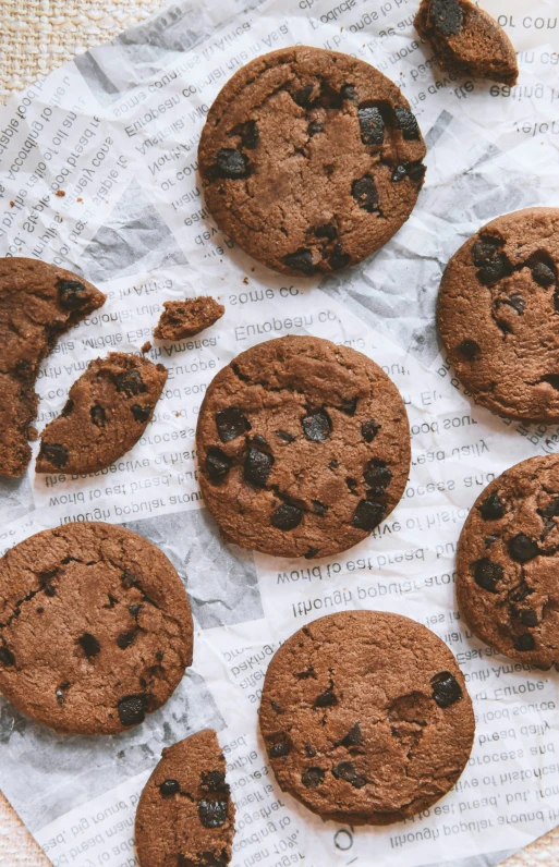 nine cookies that have been broken together and left on paper