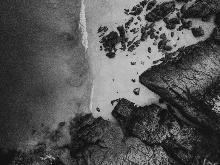 an aerial s of some rocks and water