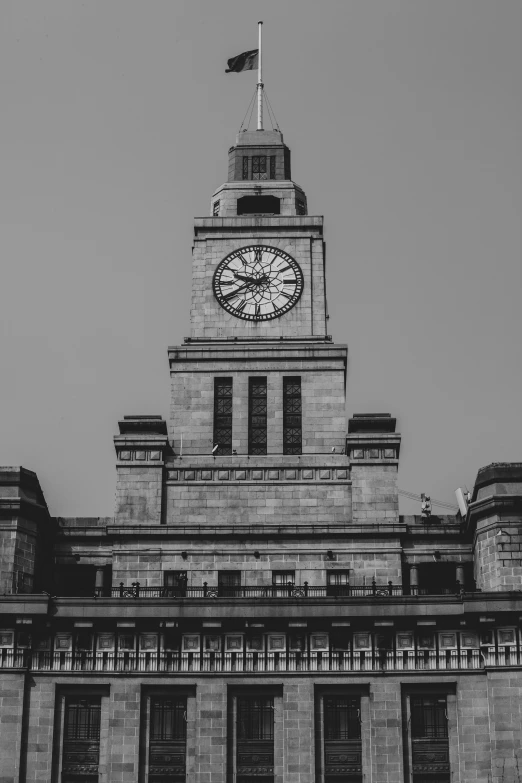 a black and white po of a tall clock tower