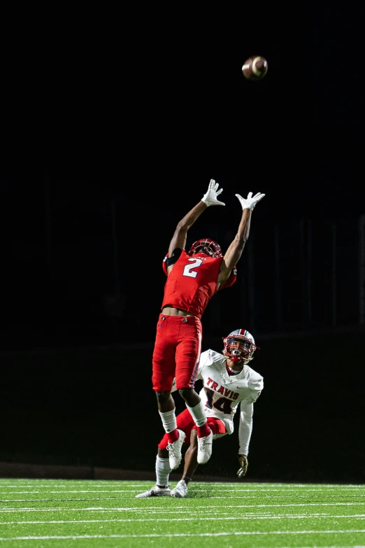 two football players in action on the field