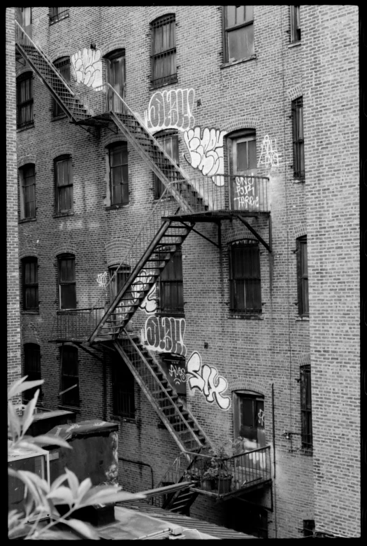 a staircase has graffiti and graffiti on it