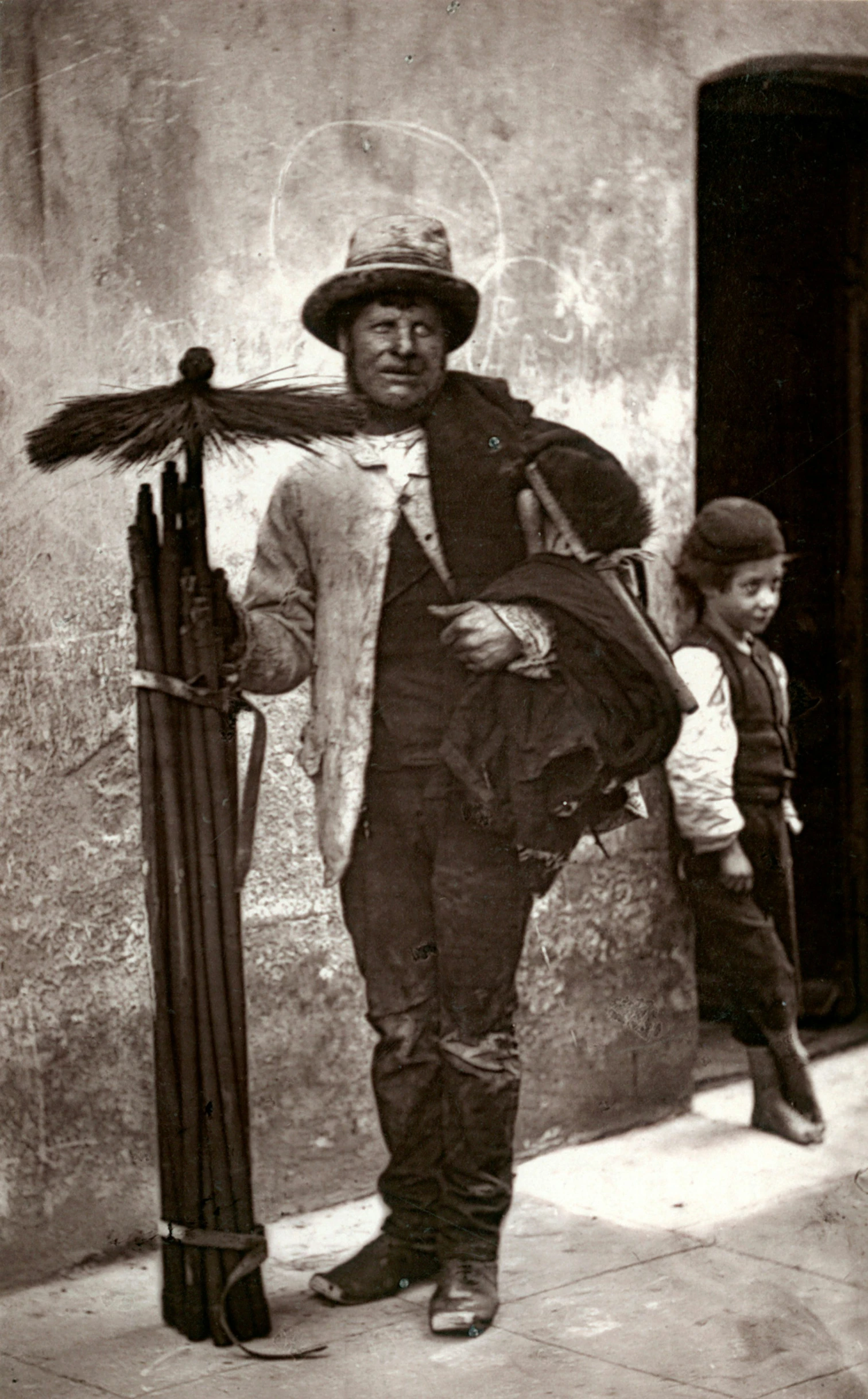 an old picture of a person and a child