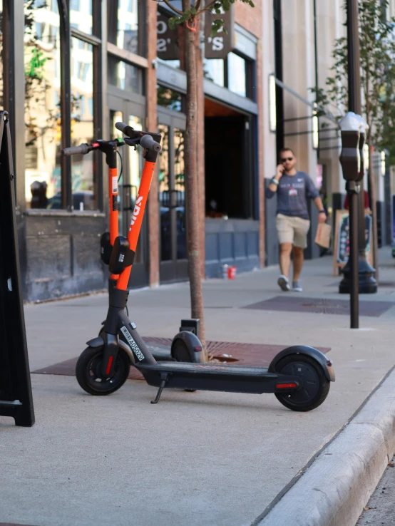 a scooter is parked on the side of a street