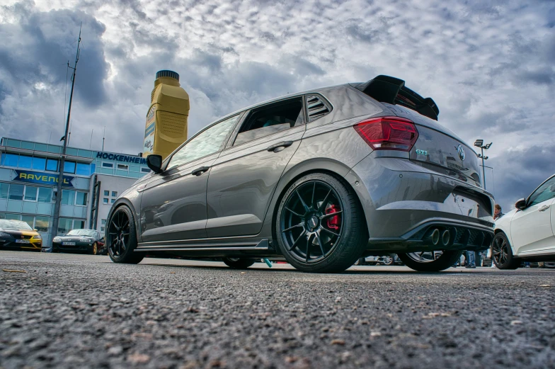 the rear end of a car on a parking lot