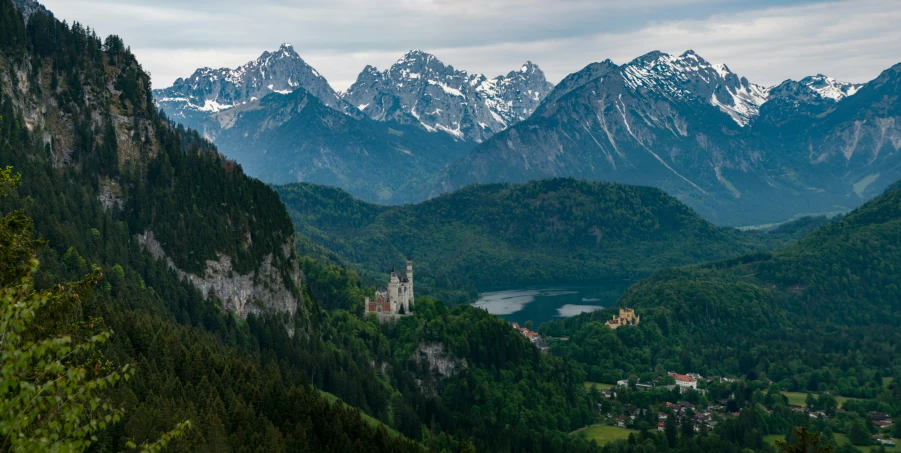 a scenic view of a mountain top in the distance