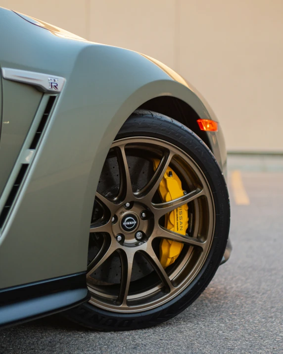 the wheel and ke rims of a green car