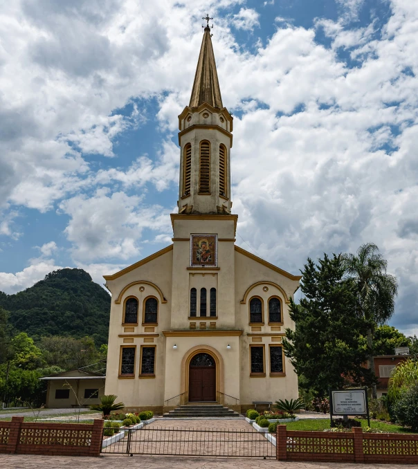 an old church with a clock on the top