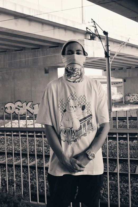 a man wearing a t - shirt with words written on it