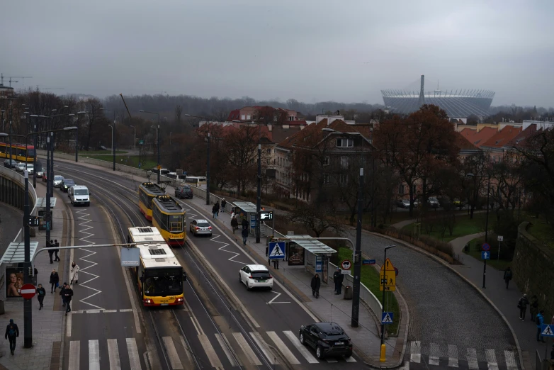 a city street filled with lots of buses