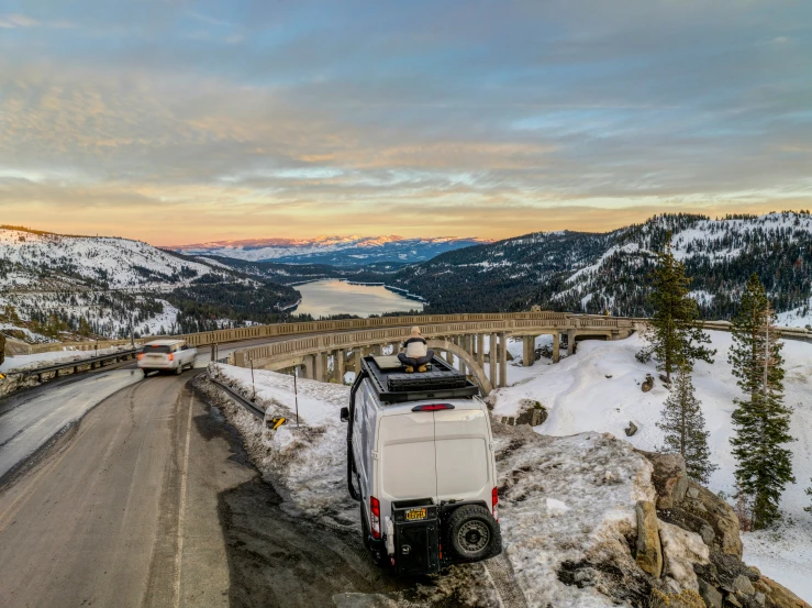 a big truck traveling on a snowy road