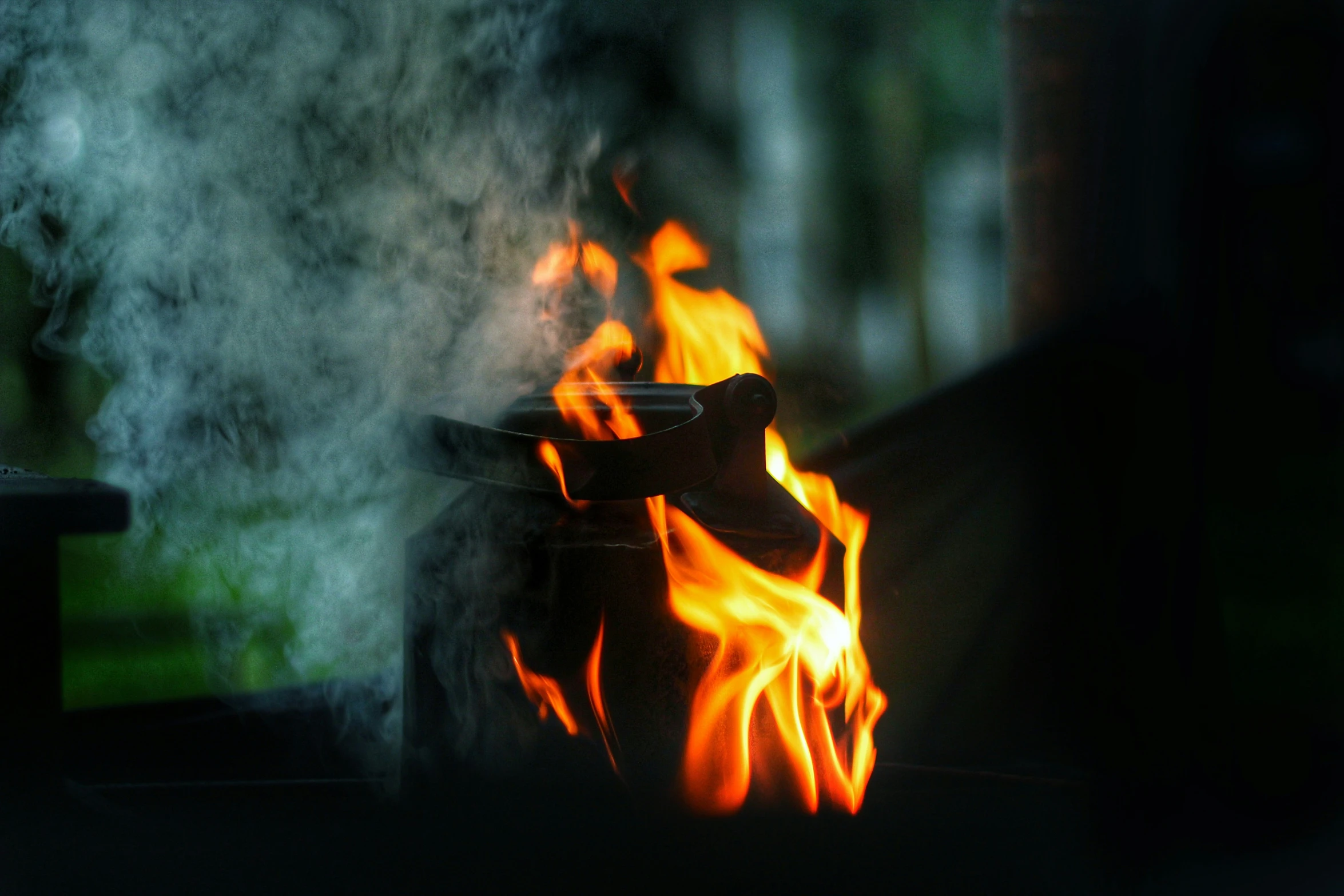 smoke coming from the fireplace of a house