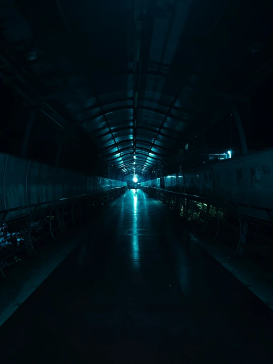 a train parked in a station at night