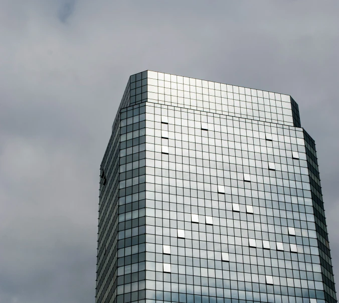 the corner of a glass office building