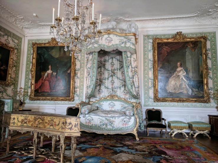 the room has many paintings on it