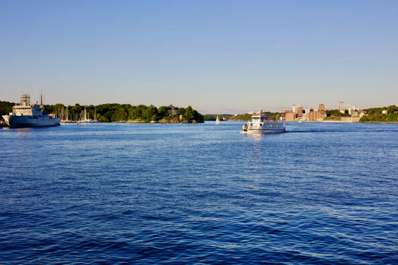 a waterway full of boats traveling through it