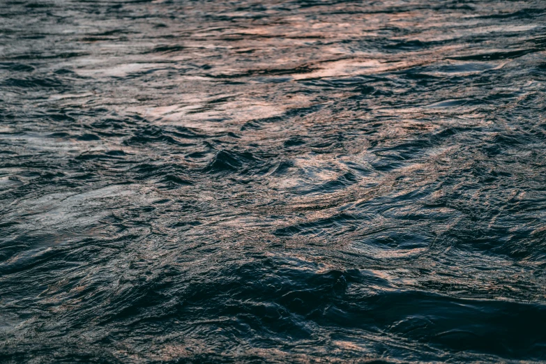 an airplane flying in the sky while on water