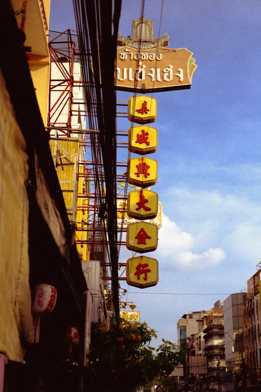 street signs on a busy city street near some buildings