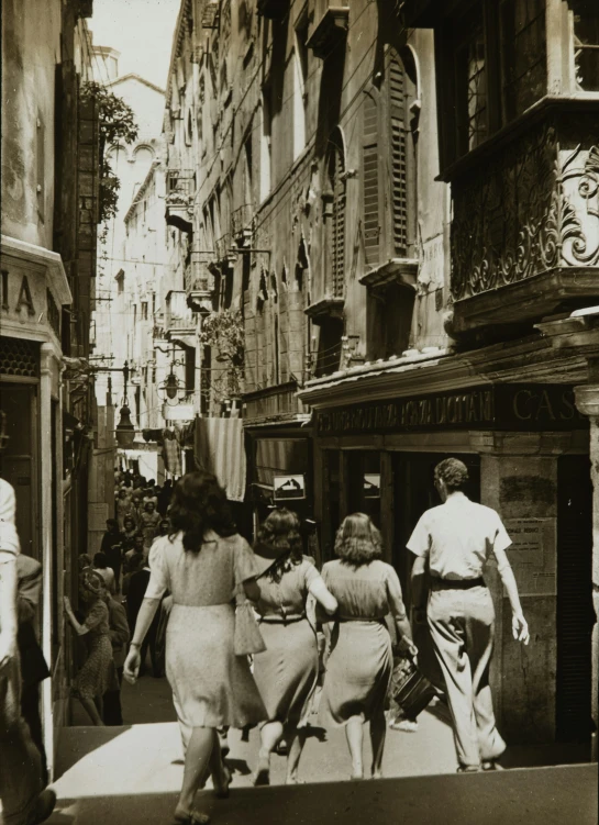 this old black and white po is of some girls walking down the street