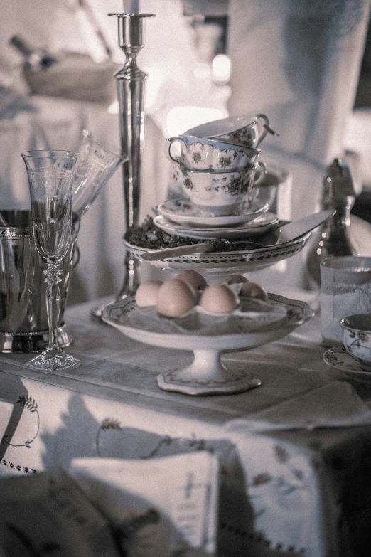 there is an assortment of tea and glasses on the table